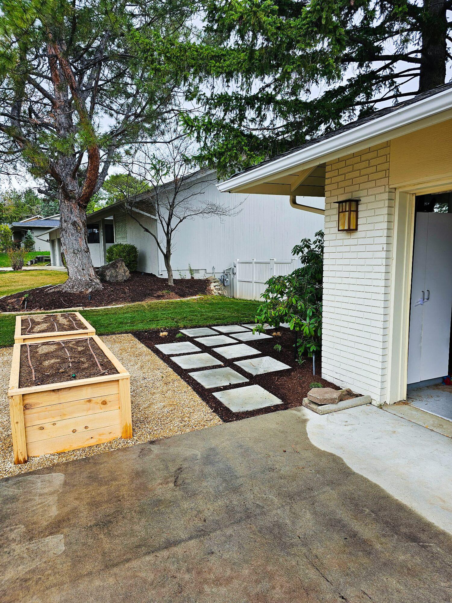Paver stepping stones with garden boxes
