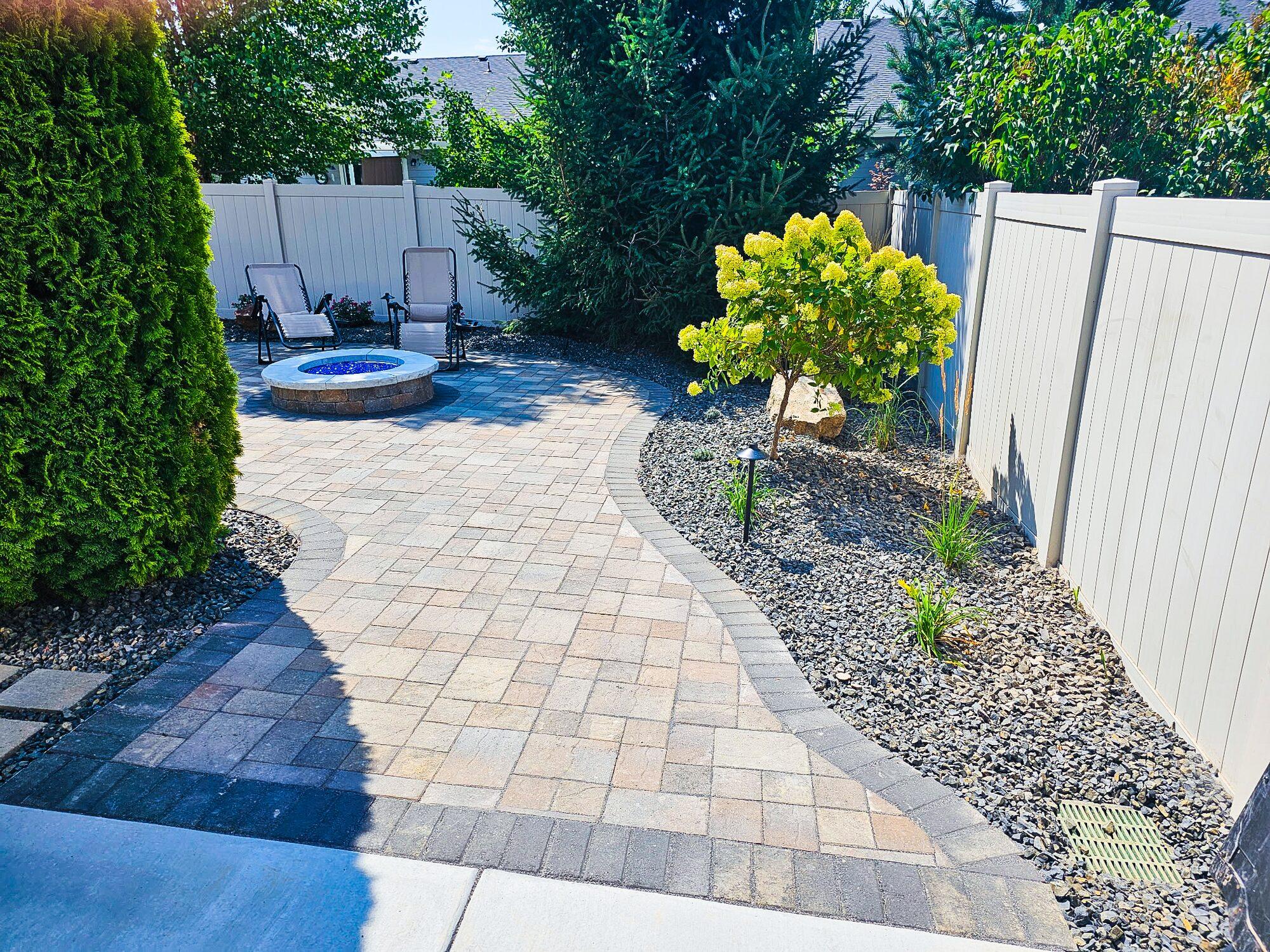 Paver patio with a built-in fire pit